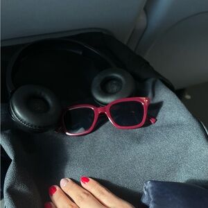 Red Sunglasses and Black Headphones